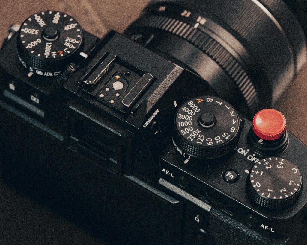 Detailed shot of a vintage-style camera dial with visible settings and controls.
